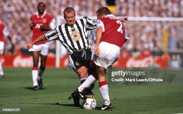May 1998 FA Challenge Cup Final Arsenal v Newcastle United, Alan Shearer of Newcastle goes in high to win a 50-50 tackle with Lee Dixon of Arsenal.