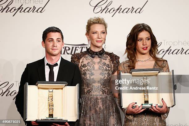 Actors Logan Lerman, Cate Blanchett and Adele Exarchopoulos pose onstage at the Chopard Trophy during the 67th Annual Cannes Film Festival on May 15,...