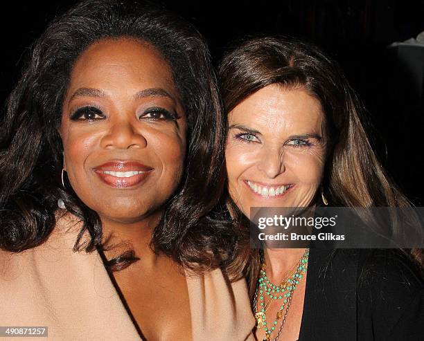 Oprah Winfrey and Maria Shriver pose backstage at the hit musical "After Midnight" on Broadway at The Brooks Atkinson Theater on May 15, 2014 in New...
