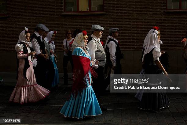 Chulapas take part in the San Isidro procession during the San Isidro festivities on May 15, 2014 in Madrid, Spain. During the festivities in honor...