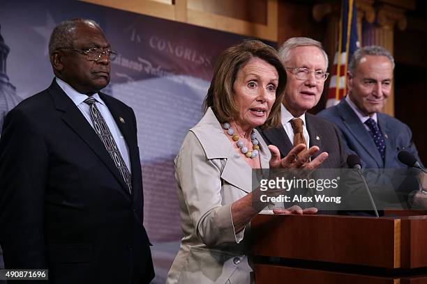 House Minority Leader Rep. Nancy Pelosi speaks as Assistant House Minority Leader Rep. James Clyburn , Senate Minority Leader Sen. Harry Reid , and...
