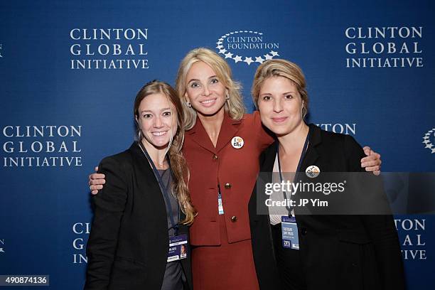 Emma Gross, CGI Committments, Eugenia Makhlin, CEO and Co-Founder of ELBI and Corinna Sayn-Wittgenstein pose for a photograph before the closing...