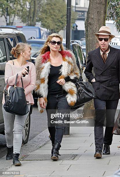 Kate Moss and James Brown are seen on March 15, 2011 in London, United Kingdom.