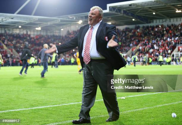 Steve Evans, manager of Rotherham United tells the home supporters to get off the pitch during the Sky Bet League One Play Off Semi Final Second Leg...