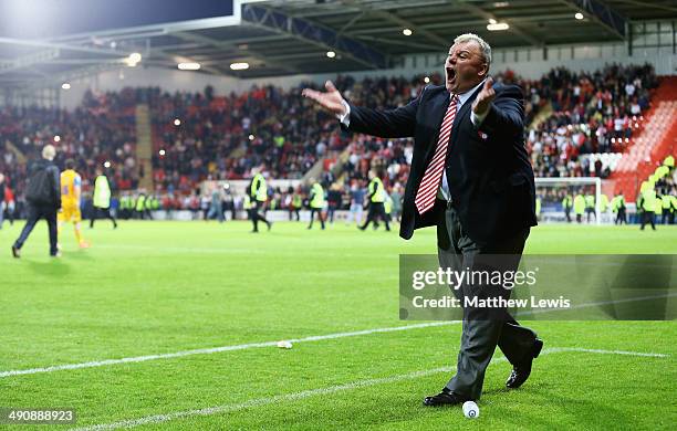 Steve Evans, manager of Rotherham United tells the local supporters to get off the pitch during the Sky Bet League One Play Off Semi Final Second Leg...