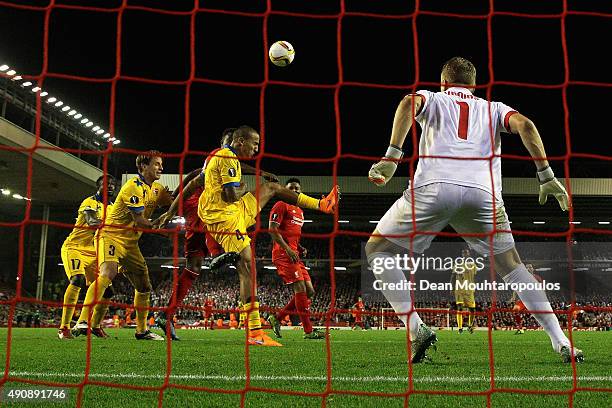 Leo Lacroix of FC Sion and Divock Origi of Liverpool compete for the ball during the UEFA Europa League group B match between Liverpool FC and FC...