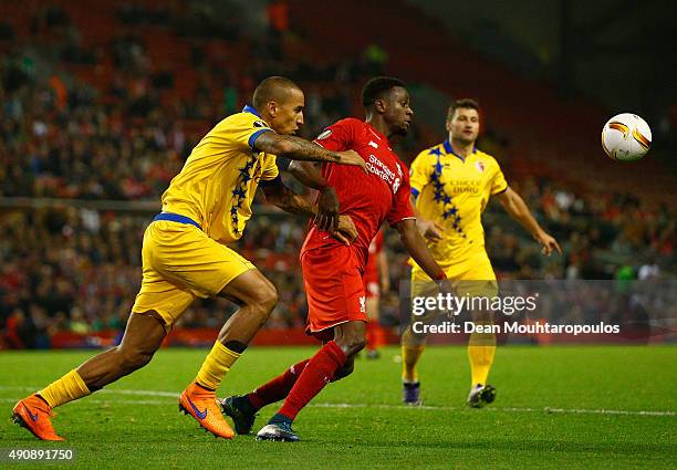 Leo Lacroix of FC Sion and Divock Origi of Liverpool compete for the ball during the UEFA Europa League group B match between Liverpool FC and FC...