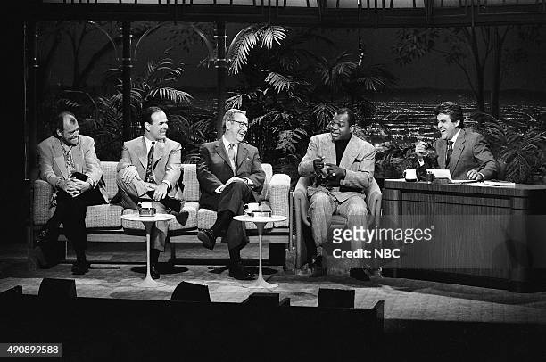 Pictured: Musical guest Joe Cocker, actor Larry Miller, journalist John Chancellor, and actor Charles S. Dutton during an interview with guest host...