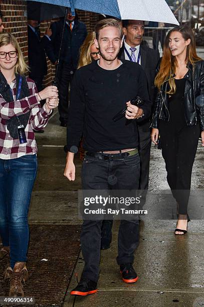 Comedian PewDiePie enters the "The Late Show With Stephen Colbert" taping at the Ed Sullivan Theater on October 1, 2015 in New York City.