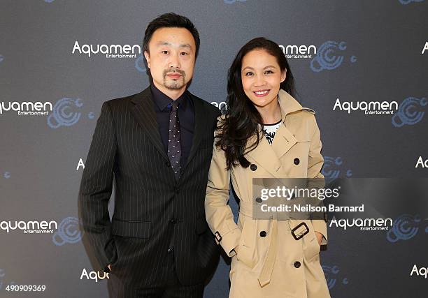 Gary Zhang and Lois Xu attend the 2014 Cannes Aquamen KONG Event At Mandala Beach / Cheri Cheri during the 67th Annual Cannes Film Festival at...