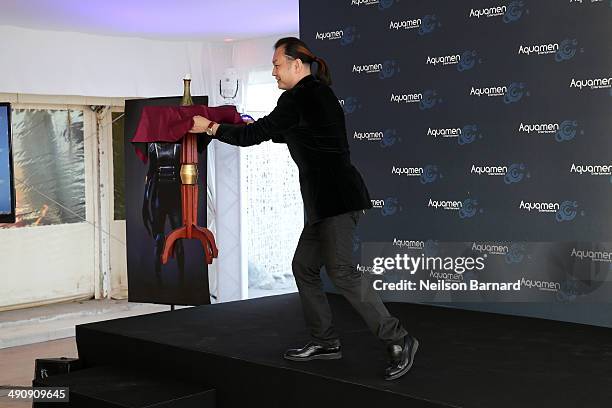 Li Ning performs onstage at the 2014 Cannes Aquamen KONG Event At Mandala Beach / Cheri Cheri during the 67th Annual Cannes Film Festival at Mandala...