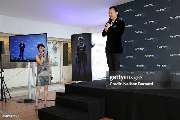 Li Ning performs onstage at the 2014 Cannes Aquamen KONG Event At Mandala Beach / Cheri Cheri during the 67th Annual Cannes Film Festival at Mandala...