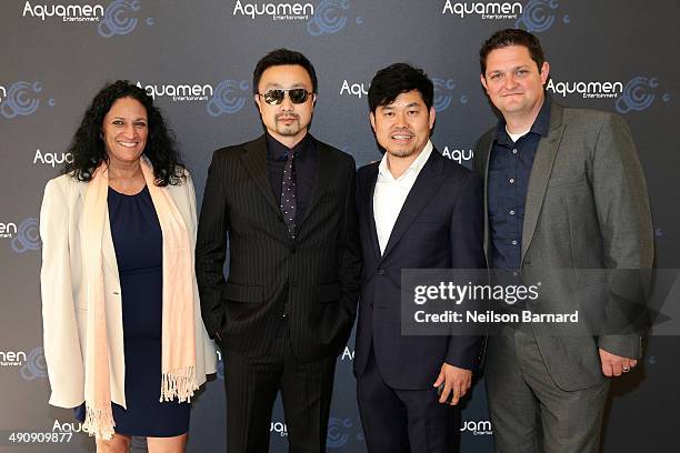 Marina Martins, Gary Zhang, JJ Kim and Adam Miller attend the 2014 Cannes Aquamen KONG Event At Mandala Beach / Cheri Cheri during the 67th Annual...