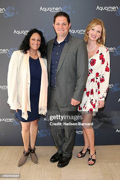 Marina Martins, Adam Miller and Jamie Miller attend the 2014 Cannes Aquamen KONG Event At Mandala Beach / Cheri Cheri during the 67th Annual Cannes...