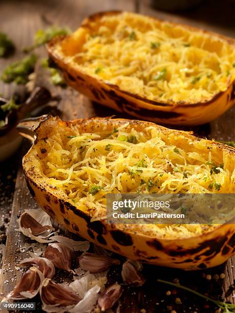 roasted spaghetti squash with garlic herb butter - squash side dish stock pictures, royalty-free photos & images