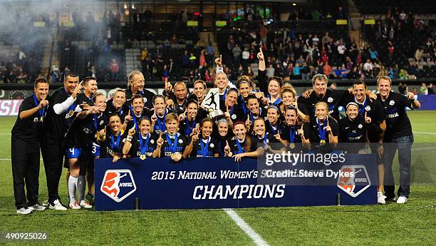 The FC Kansas City team pose for a photo after winning the NWSL Championship over the Seattle Reign FC by a score of 1-0 at Providence Park on...