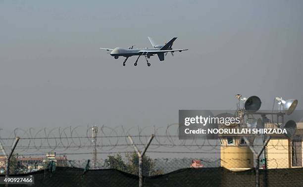 Drone aircraft lands at Afghanistan's Jalalabad Airport where a US C-130 military transport plane crashed in Jalalabad on October 2, 2015. The...