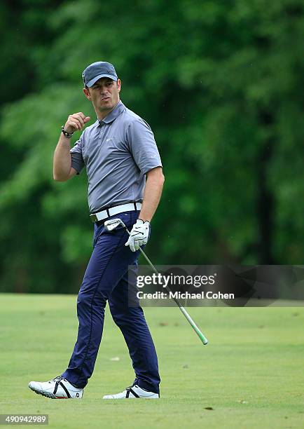 Celebrity golfer Greg Ellis reacts to his shot during the first round of the BMW Charity Pro-Am Presented by SYNNEX Corporation held at the...