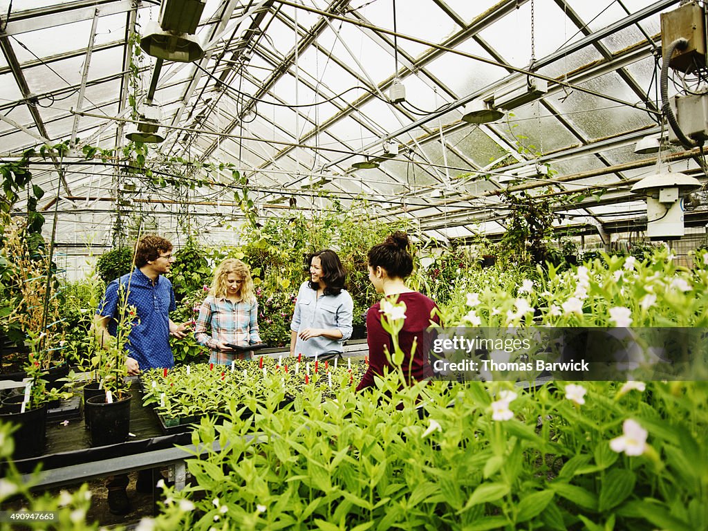 Group of botanists in research greenhouse