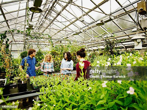 Group of botanists in research greenhouse