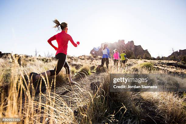 group running. - bend oregon stock pictures, royalty-free photos & images