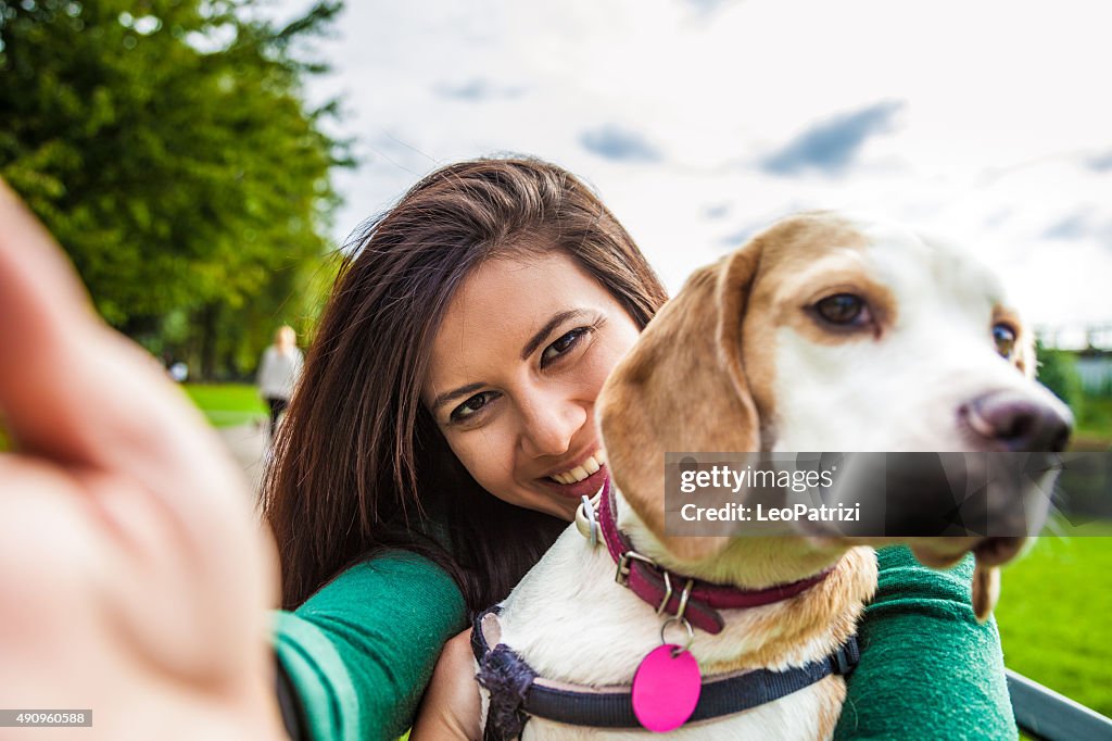 Pet owner and her dog taking a selfie