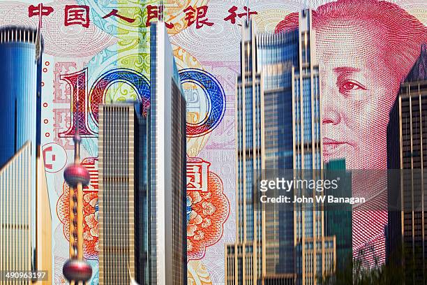 money behind shanghai skyline - images of chinese yuan banknotes stock pictures, royalty-free photos & images