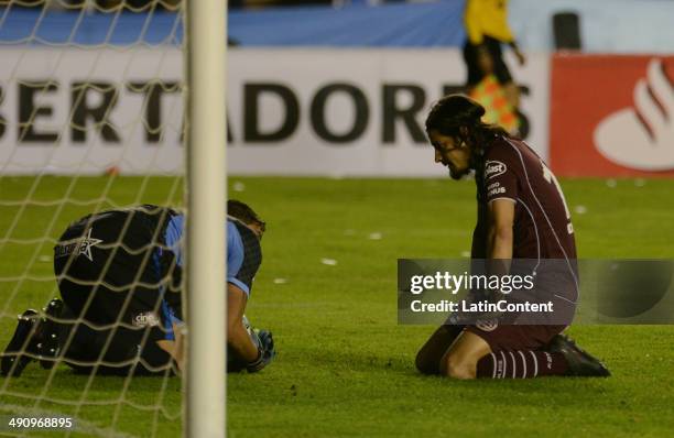 Ismael Blanco laments after Javier Quiñónez stops a scoring opportunity during a second leg quarter final match between Bolívar and Lanús as part...
