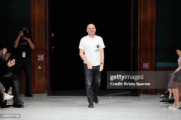 Designer Hussein Chalayan appears on the runway after the Chalayan show as part of the Paris Fashion Week Womenswear Spring/Summer 2016 on October 2,...