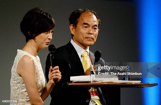Nobel Prize laureate Shuji Nakamura and presenter Christel Takigawa talk during the Asahi World Environment Forum at the Imperial Hotel on October 1,...