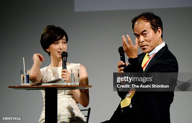 Nobel Prize laureate Shuji Nakamura and presenter Christel Takigawa talk during the Asahi World Environment Forum at the Imperial Hotel on October 1,...