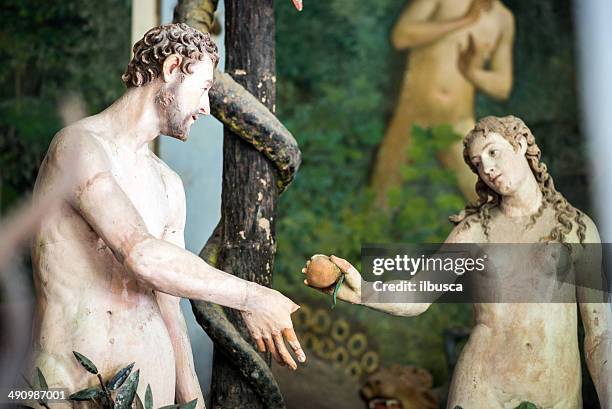 antique (ca. 1400-1500) statues in italian original sin chapel - adam stock illustrations