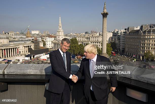 British Conservative MP for Richmond Park, and London 2016 mayoral candidate, Zac Goldsmith , poses for photographers with current Mayor of London...