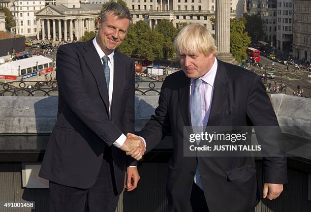 British Conservative MP for Richmond Park, and London 2016 mayoral candidate, Zac Goldsmith , poses for photographers with current Mayor of London...