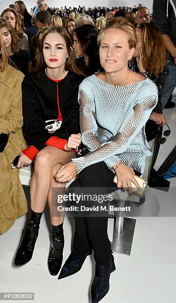Laura Love and Olympia Scarry attend the Christian Dior show as part of the Paris Fashion Week Womenswear Spring/Summer 2016 on October 2, 2015 in...