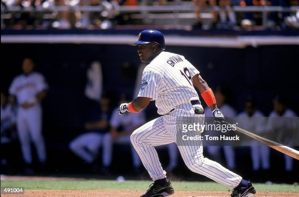 Tony Gwynn of the San Diego Padres drops the bat to run during the game against the Houston Astros at the Qualcomm Stadium in San Diego, California....