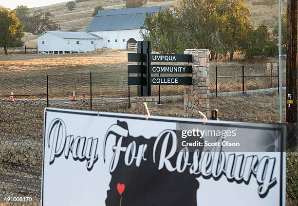 Sign sits along the road to Umpqua Community College on October 2, 2015 in Roseburg, Oregon. Yesterday 10 people were killed and another seven were...
