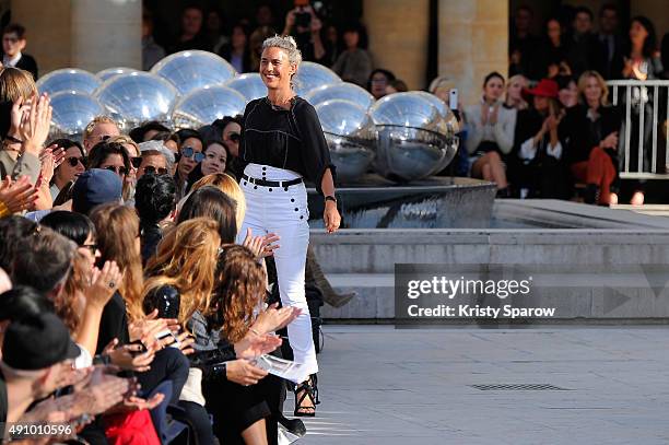 Designer Isabel Marant salutes the audience at the end of her show as part of the Paris Fashion Week Womenswear Spring/Summer 2016 on October 2, 2015...