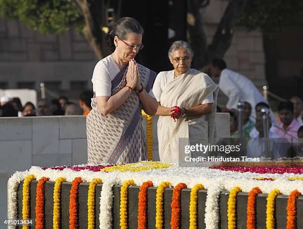 Congress President Sonia Gandhi pays tribute to Mahatma Gandhi on his 146th birth anniversary at Rajghat on October 2, 2015 in New Delhi, India....