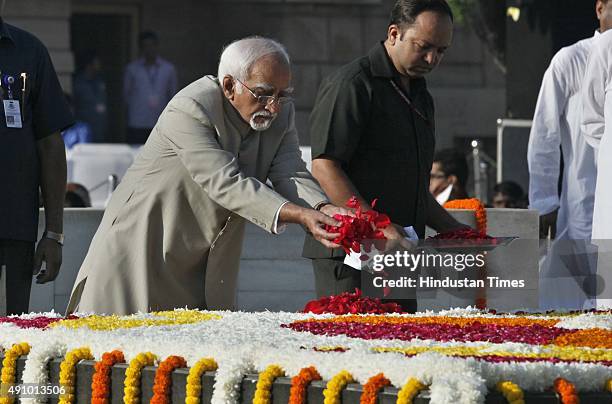 Vice President Hamid Ansari pays tribute to Mahatma Gandhi on his 146th birth anniversary at Rajghat on October 2, 2015 in New Delhi, India....
