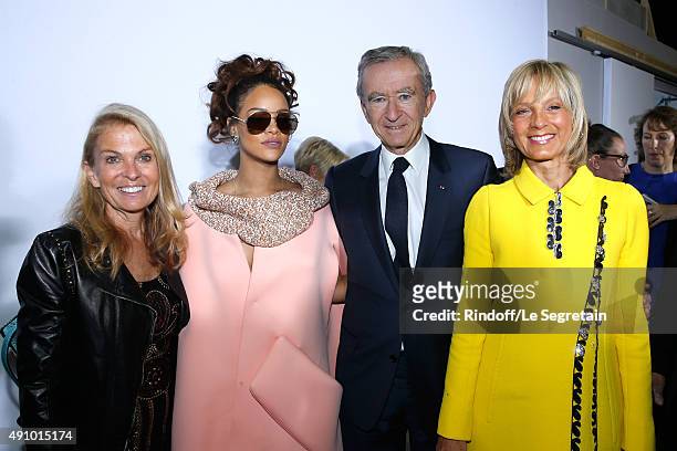 Ambassador of USA in France, Jane D. Hartley, Singer Rihanna, Owner of LVMH Luxury Group Bernard Arnault and his wife Helene Arnault pose Backstage...