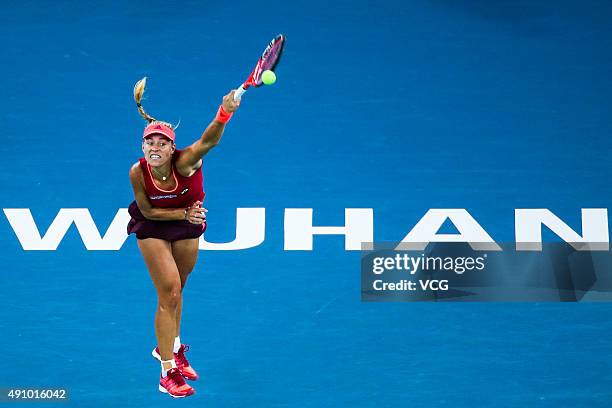 Angelique Kerber of Russia returns a shot against Garbine Muguruza of Spain in semi-final match during day six of 2015 Dongfeng Motor Wuhan Open at...