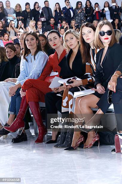 Leelee Sobieski, Chiara Mastroianni, Erin O'Connor, Elizabeth Olsen, Guest and Emilia Clarke attend the Christian Dior show as part of the Paris...