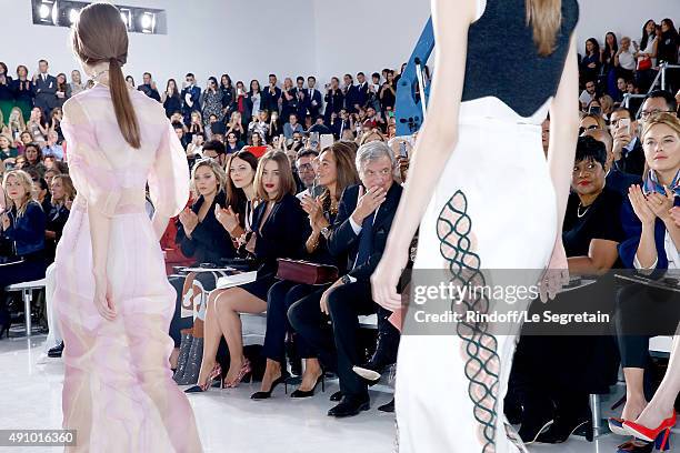 Elizabeth Olsen, Guest, Emilia Clarke and CEO Dior Sidney Toledano with his wife Katia Toledano attend the Christian Dior show as part of the Paris...