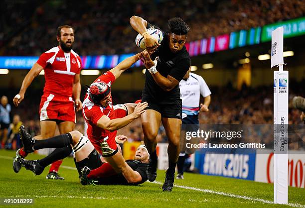 Julian Savea of the New Zealand All Blacks goes over to score their second try during the 2015 Rugby World Cup Pool C match between New Zealand and...