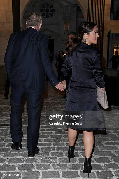 Salma Hayek and Franois-Henri Pinault arrive at the Balenciaga show as part of the Paris Fashion Week Womenswear Spring/Summer 2016 on October 2,...