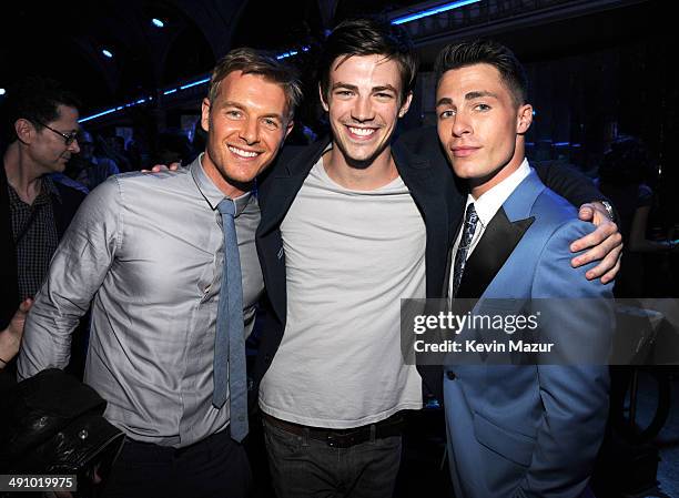 Rick Cosnett, Grant Gustin and Colton Haynes attend The CW Network's 2014 Upfront party at Paramount Hotel on May 15, 2014 in New York City.