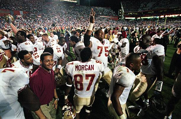 Char-ron Dorsey of the Florida State Seminoles celebrates with teammates after the game against the Florida Gators at the Ben HillGriffin Stadium in...