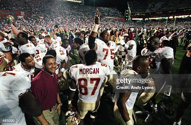 Char-ron Dorsey of the Florida State Seminoles celebrates with teammates after the game against the Florida Gators at the Ben HillGriffin Stadium in...