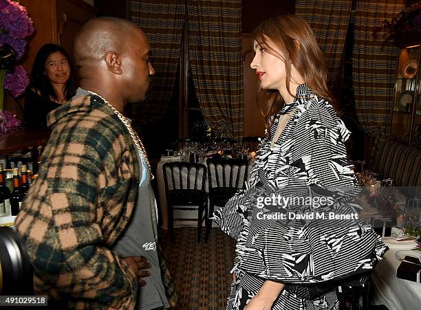 Kanye West and Roksanda Ilincic attend the Roksanda Ten Year Anniversary Dinner at Caviar Kaspia on October 2, 2015 in Paris, France.